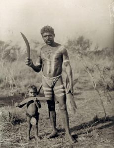 Australian Aboriginal family with boomerangs