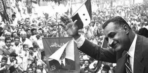 Egyptian-President-Gamal-Abdel-Nasser-waving-to-crowds-in-Mansoura-from-a-train-carNasser_in_Mansoura